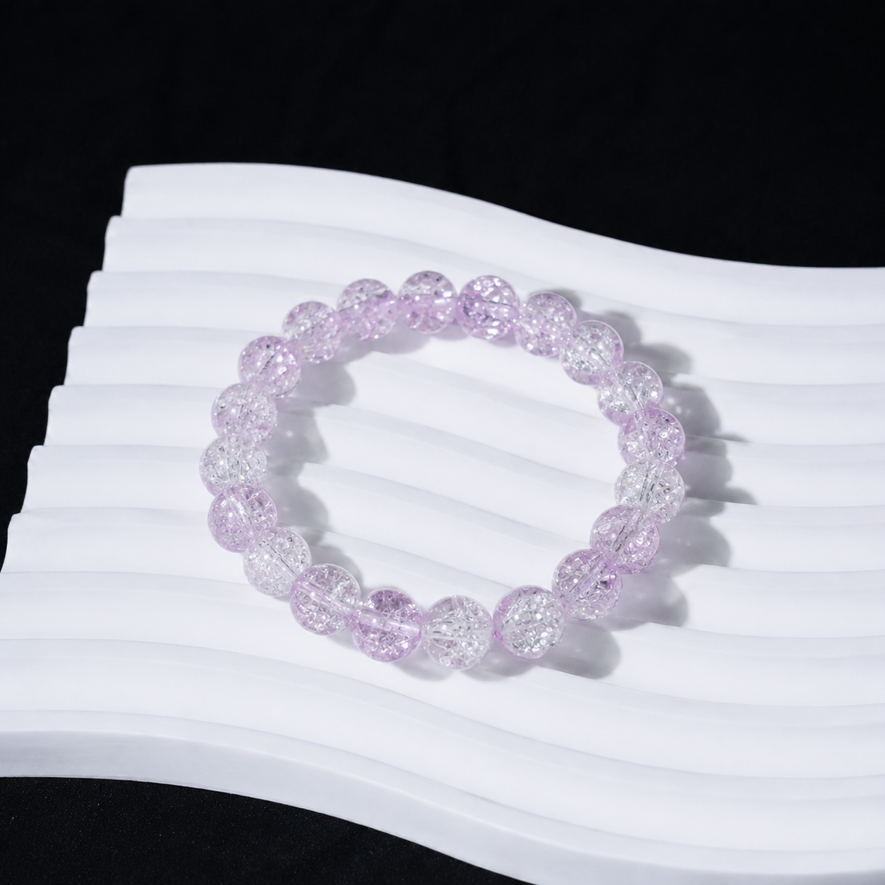 Playing with broken beads and crystal bracelets brings health benefits. (Violet)
