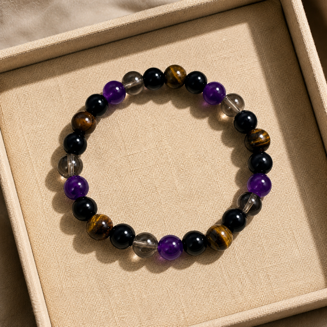 Natural stone bracelet with glass lucky charm